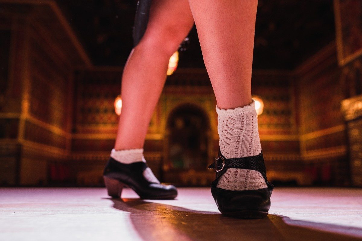 Woman in shoes dancing on stage