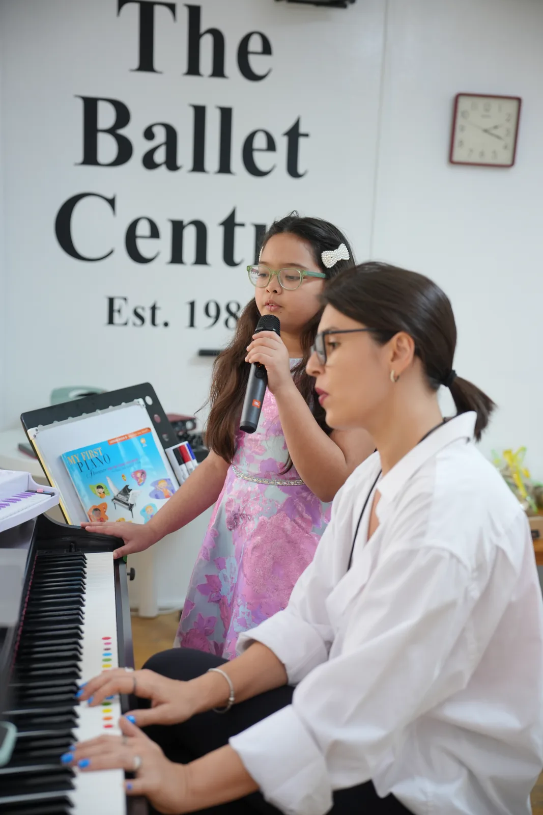 Reading a piece together at the piano