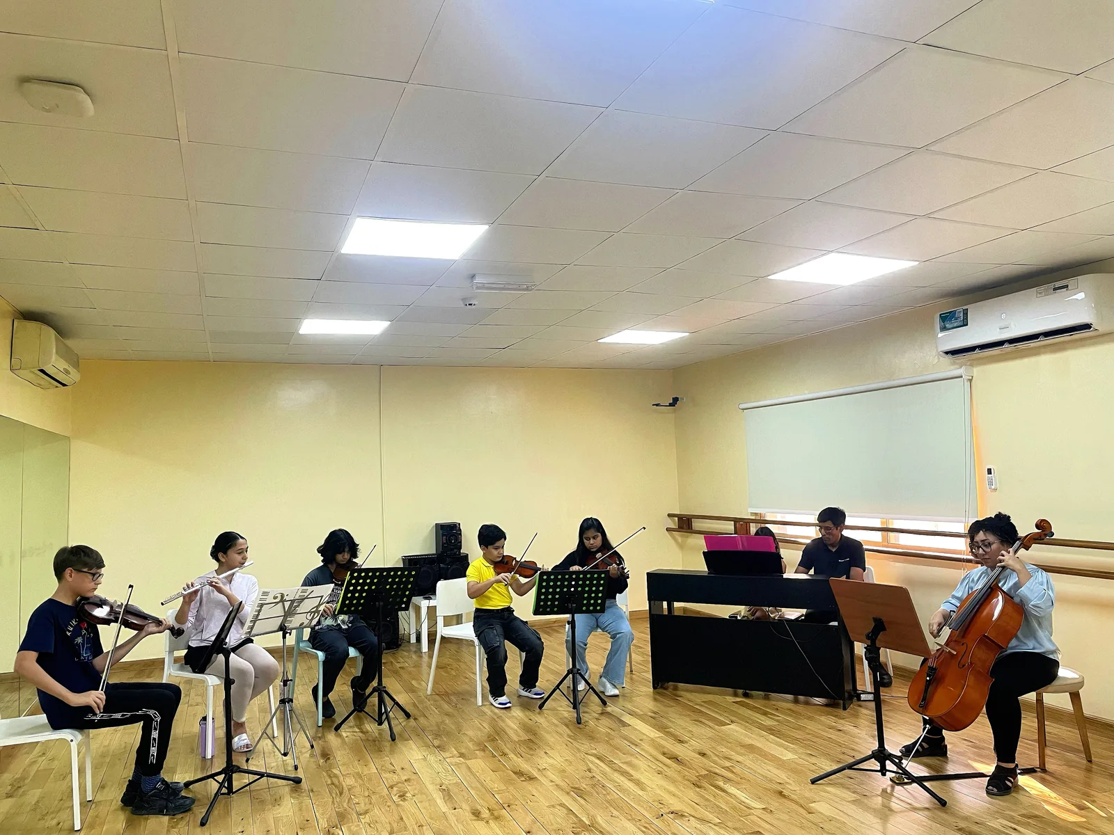 The ensemble rehearsing together