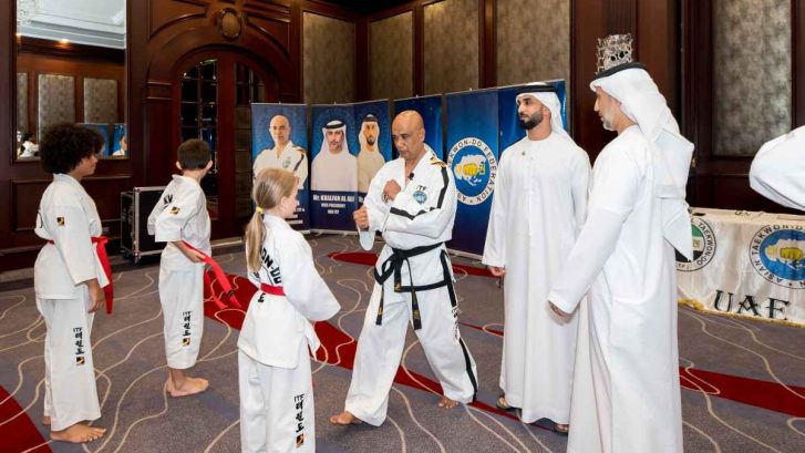 children at a taekwondo award giving ceremony
