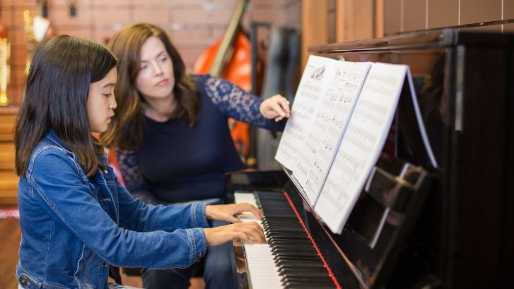 A girl playing the piano