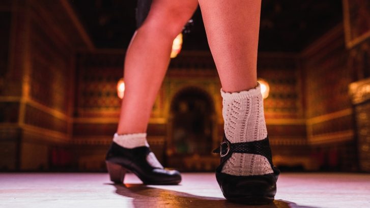 Woman in shoes dancing on stage